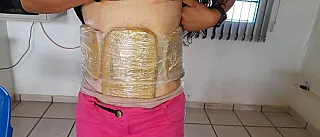 Mulher com maconha amarrada na barriga é presa em Campo Grande