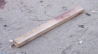 Atual agride a pauladas ex-marido de mulher após briga em frente de casa